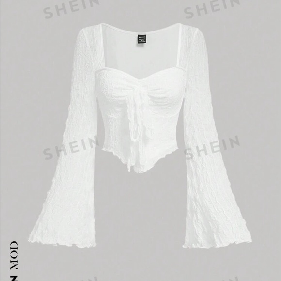 Tie front bell sleeve top. - Picture 1 of 3